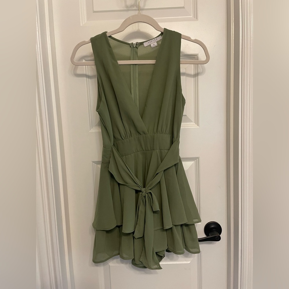 Green deep V romper with ruffles